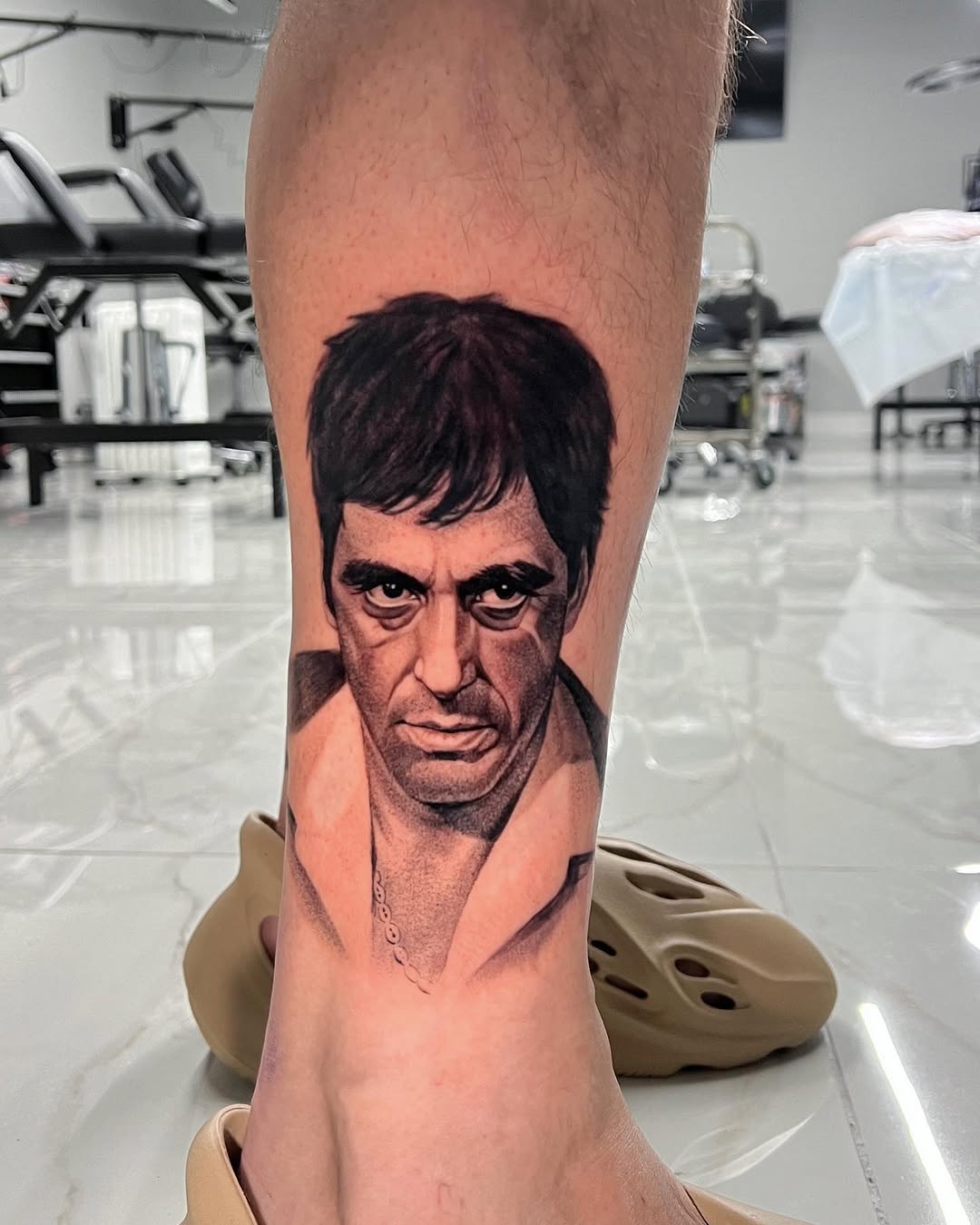 Al Pacino as Tony Montana realism tattoo on the calf by Joey Hella Tattoo Artist