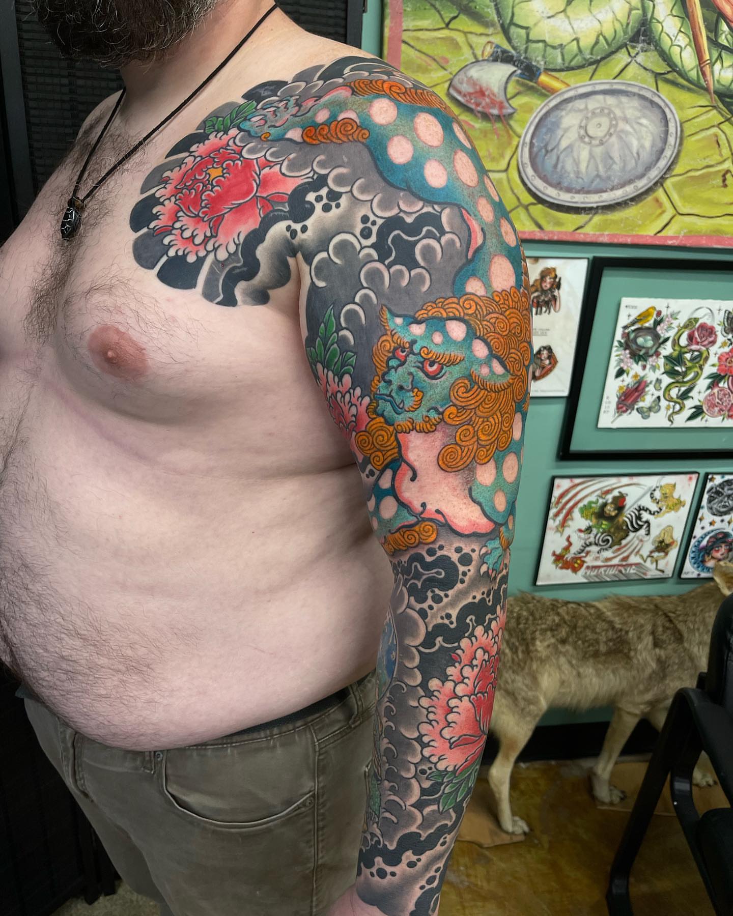 Dragon and floral japanese irezumi tattoo on the upper arm by Chris Rogers