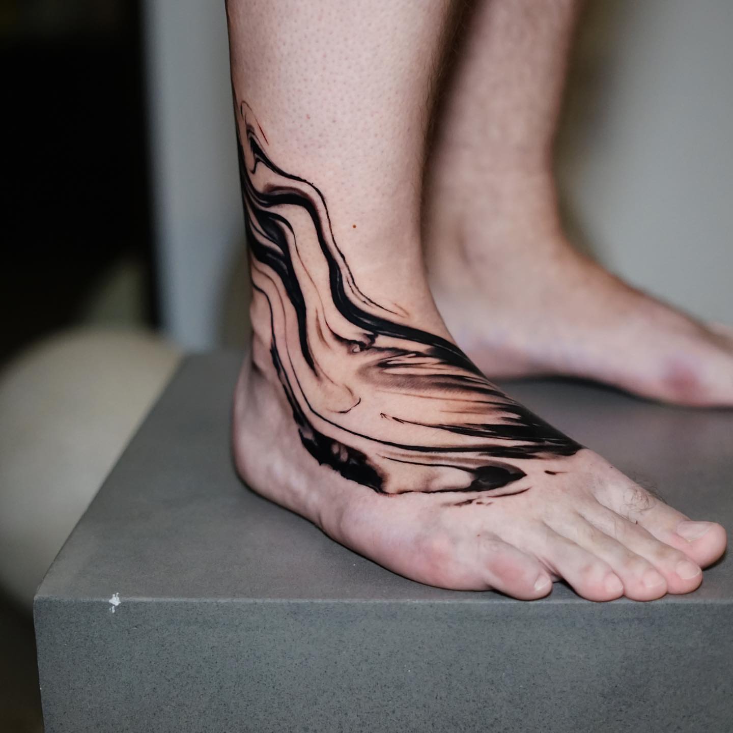 Abstract swirls black and grey tattoo on the foot by ＳＥＲＧＥＩ ＪＡＥＲ [ˈʤeɪər]