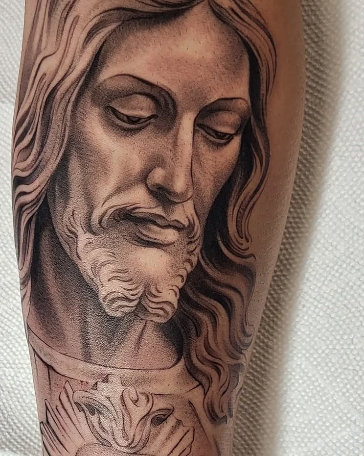 Jesus Christ portrait Chicano tattoo on the forearm by @jaclyngreb