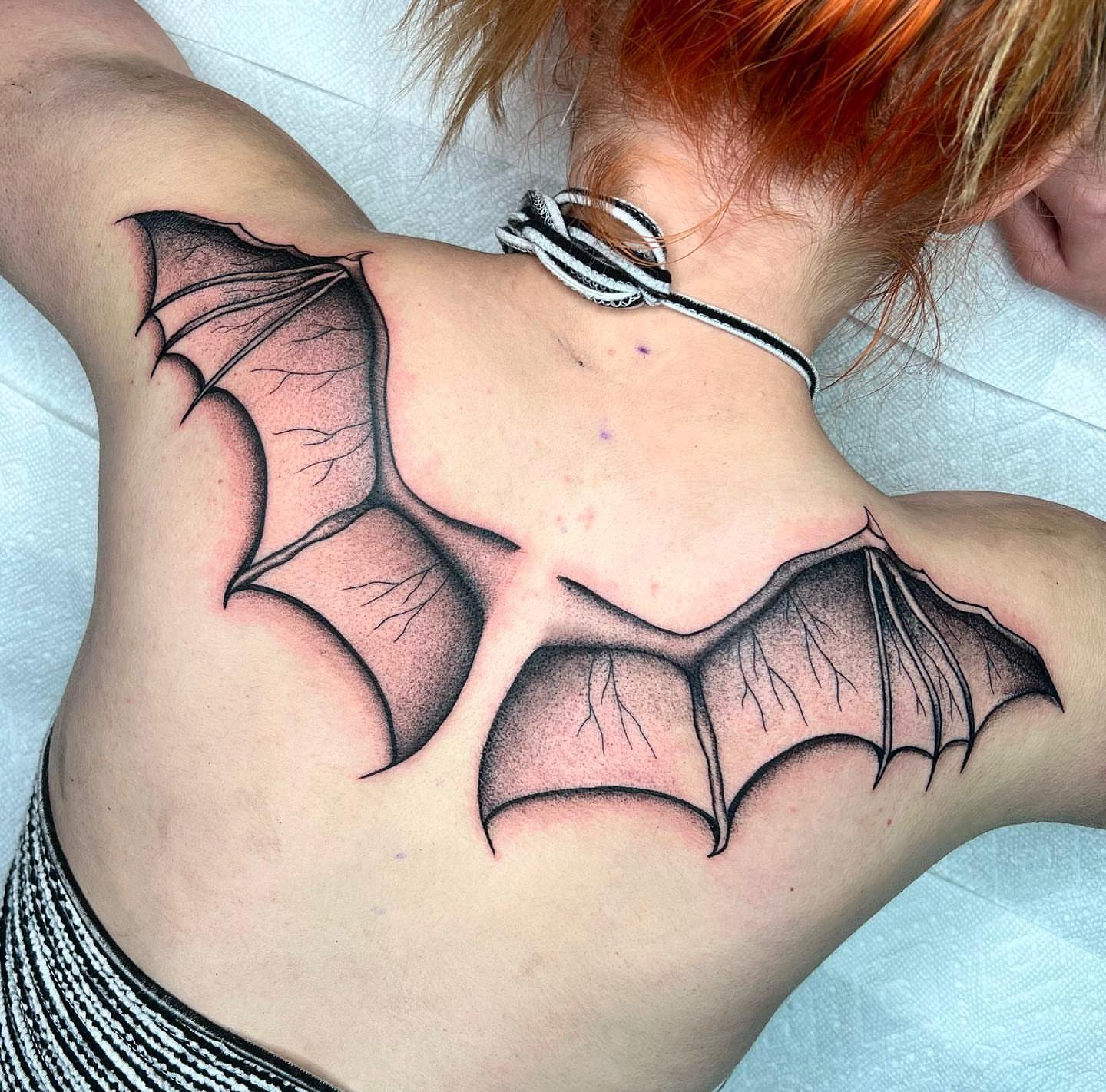 Bat wings black and grey tattoo on the back by 🤎Dannon 🕸