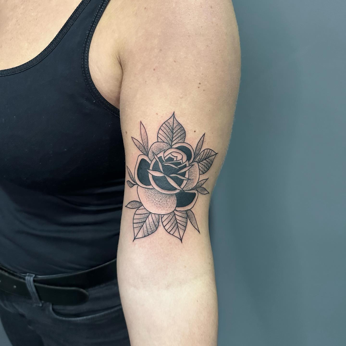 Rose black and grey tattoo on the forearm by Tattoo Artist πΊπΈ