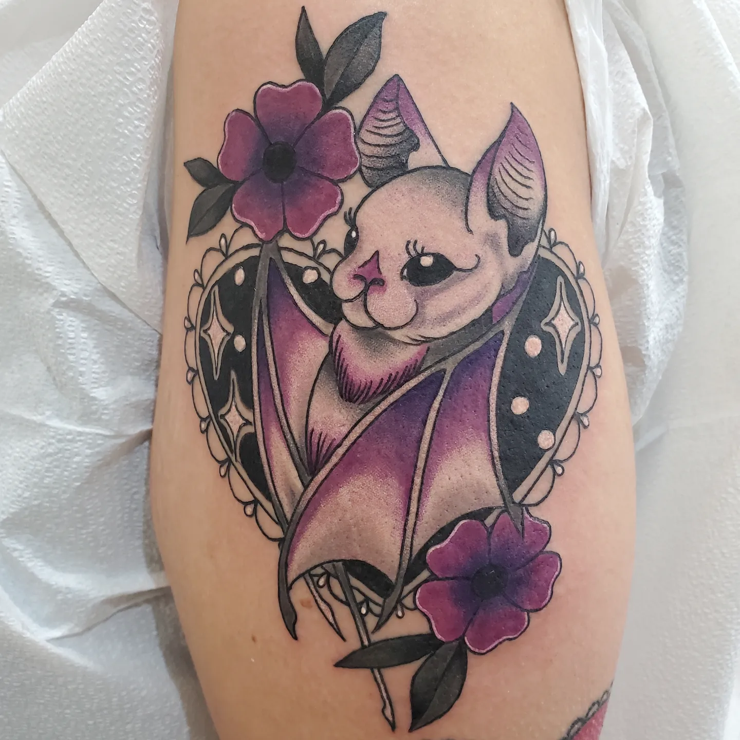 Chihuahua and flowers new school tattoo on the forearm by Ginny McCormick, Richmond, Virginia