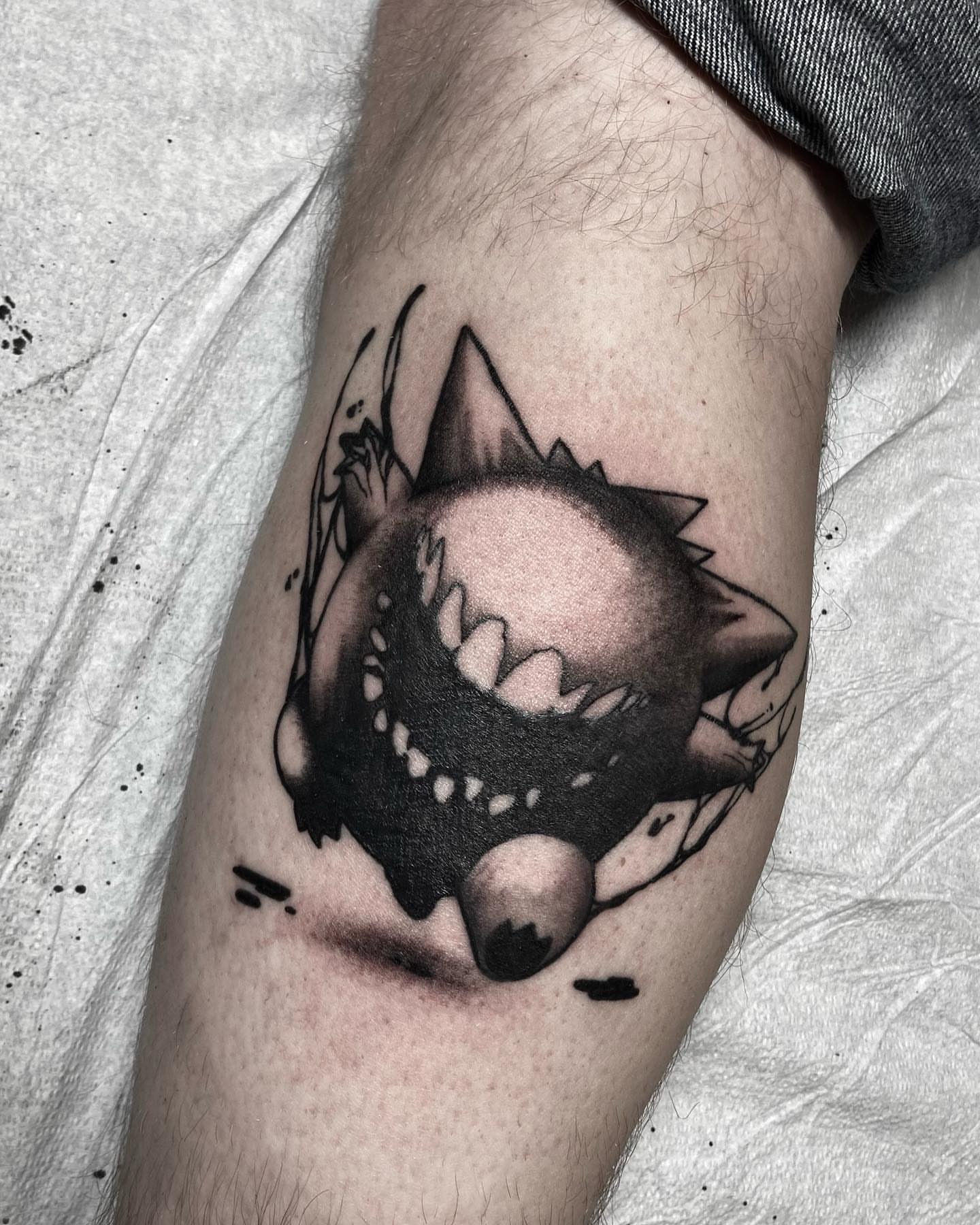 Shark black and grey tattoo on the forearm by Nathan