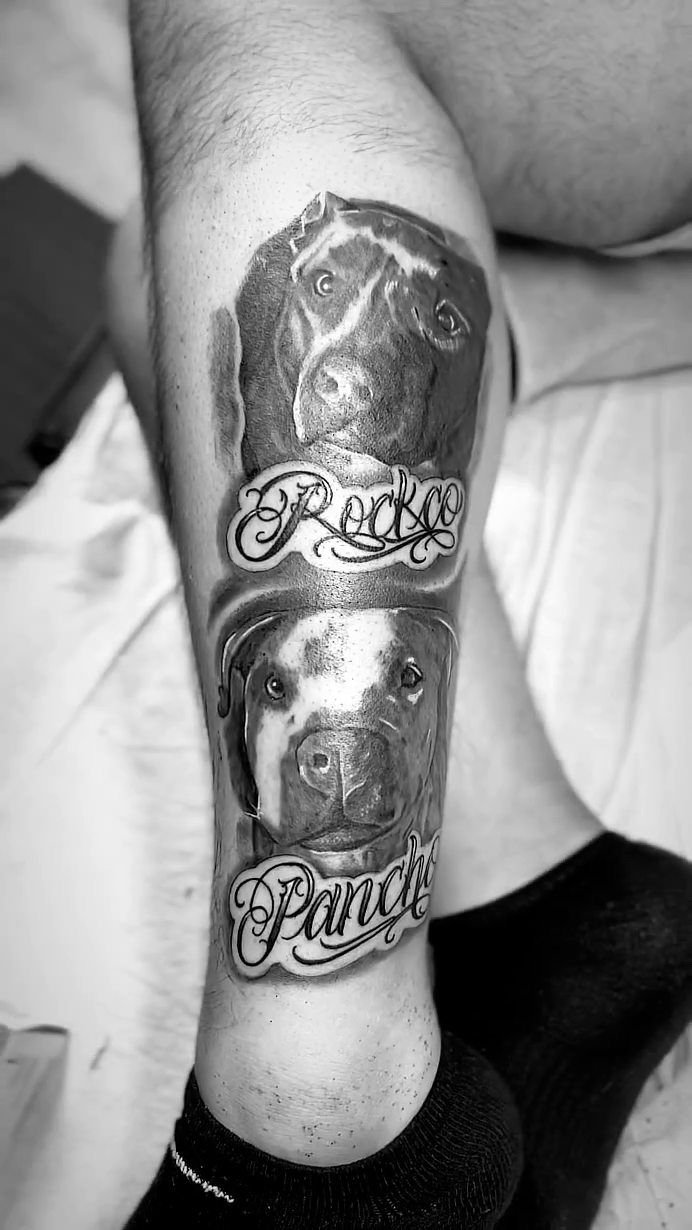 Two dogs with names realism tattoo by David Xavier Jimenez