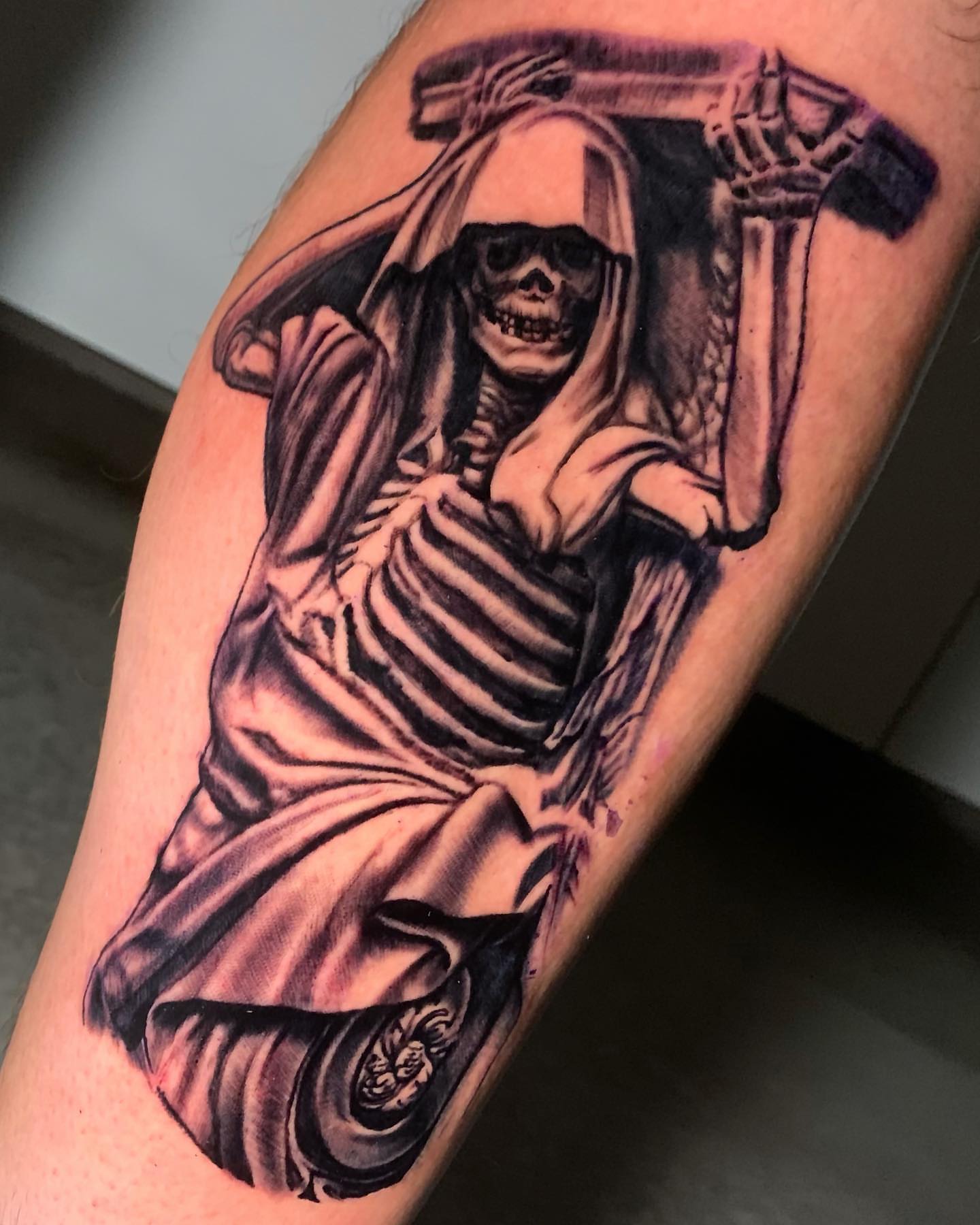 Reaper realism tattoo on the forearm by james padelt