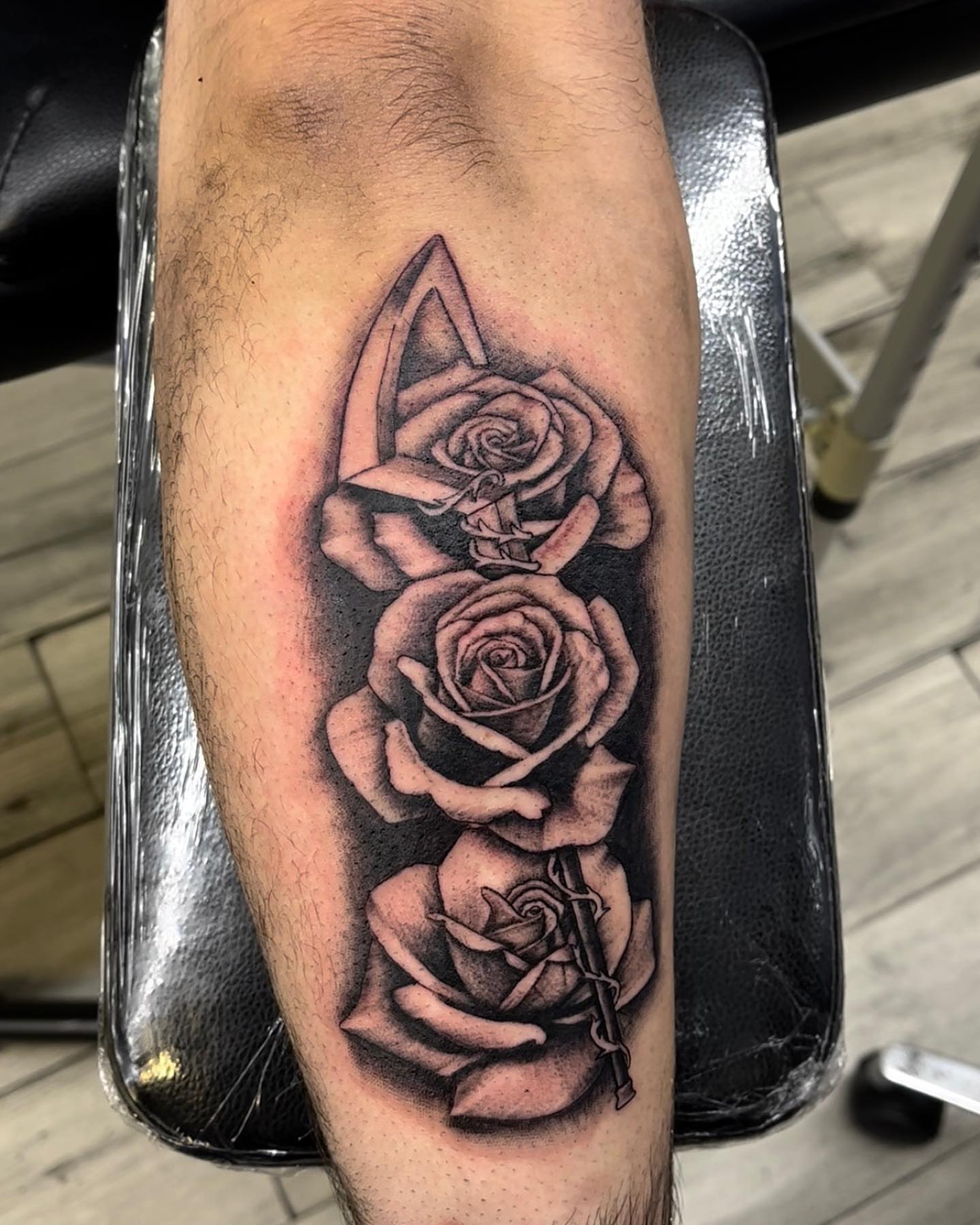 Roses and key realism tattoo on the forearm by Monique Ortiz, Mesa, Arizona