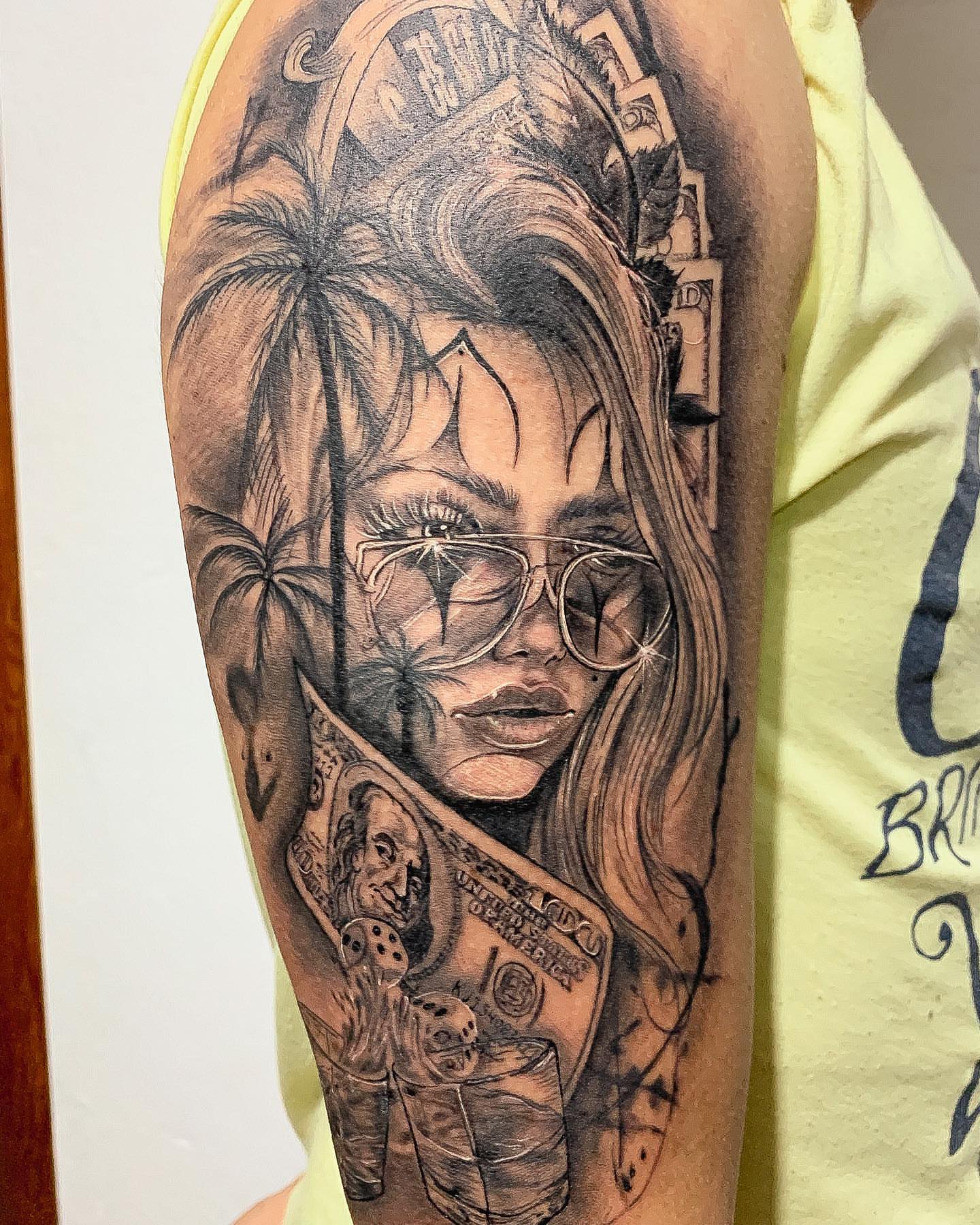 Woman with sunglasses realism tattoo on the forearm by 𝔄𝔩𝔳𝔞𝔯𝔬 𝔓𝔦𝔫𝔦𝔩𝔩𝔞