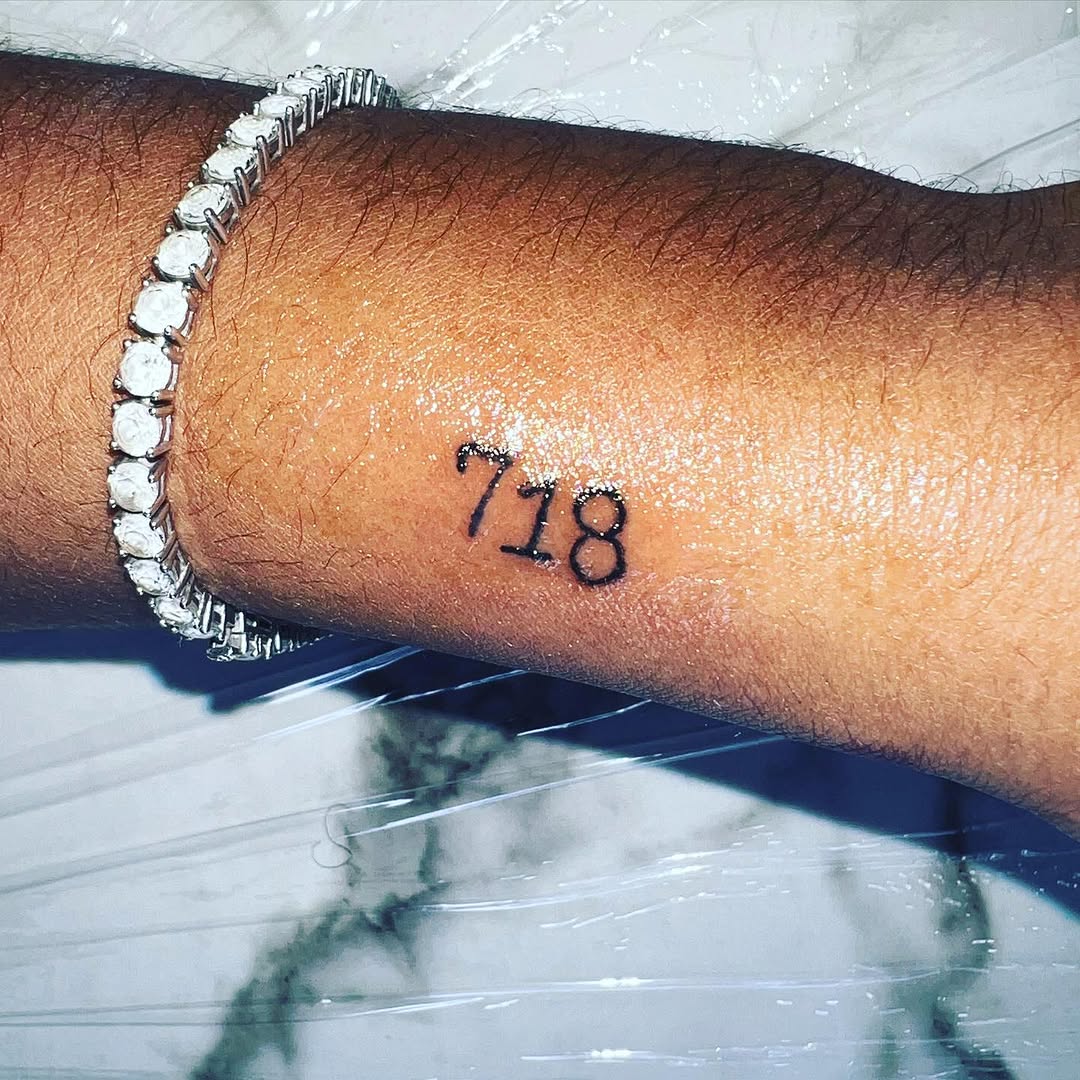 Number 718 tattoo by CmoreInk