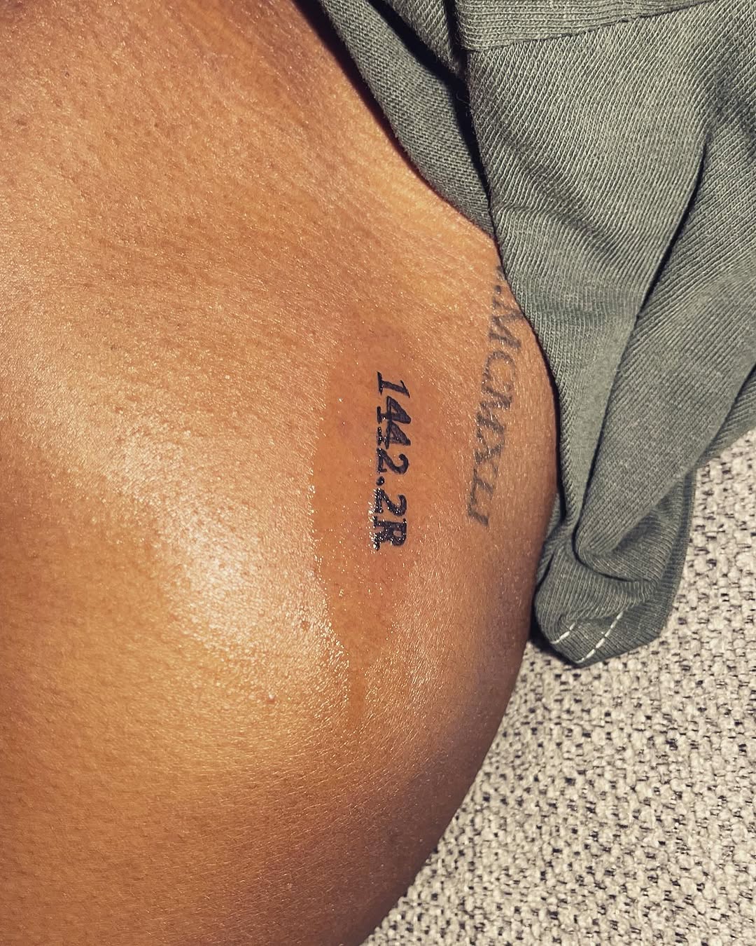Numerical and alphabetical text lettering tattoo on the chest by CmoreInk