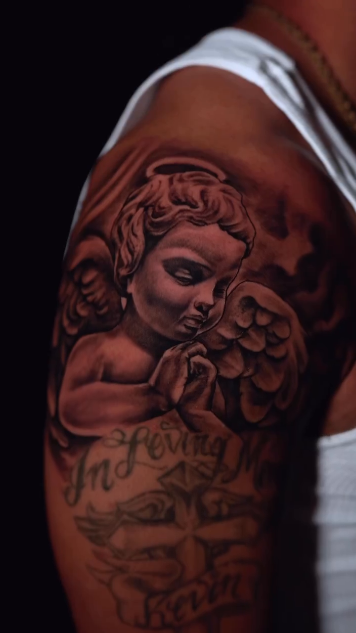 Cherub with inscription realism tattoo by Lex⛓️