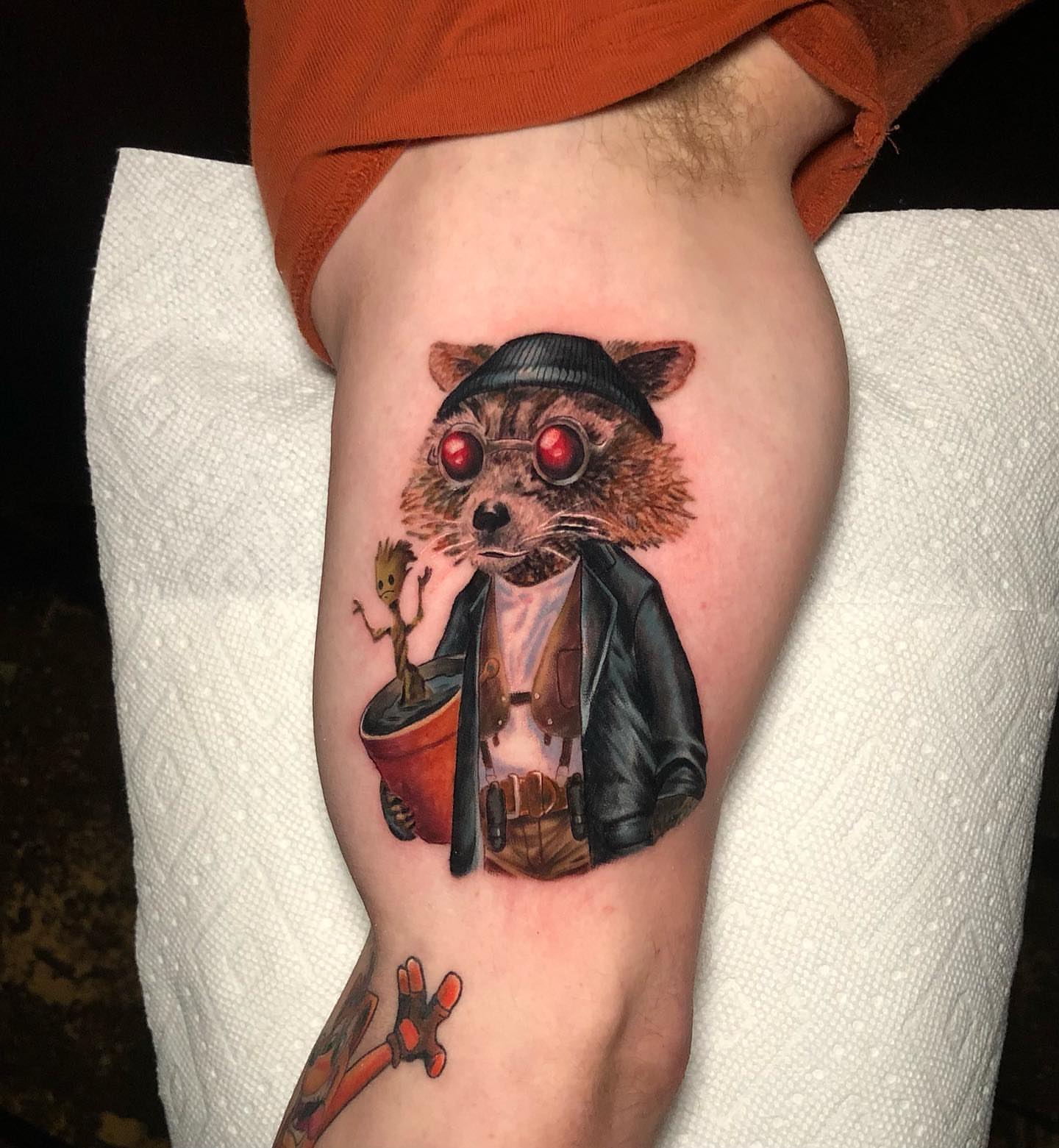Rocket raccoon and groot realism tattoo on the forearm by Tiffany Bauer