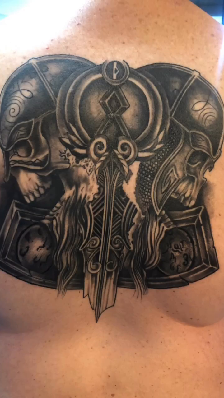Tattoo by @_dannytats — dark_realism, black_and_grey