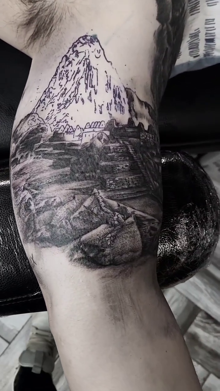 Mountain landscape with ruins realism tattoo by Alex Suarez