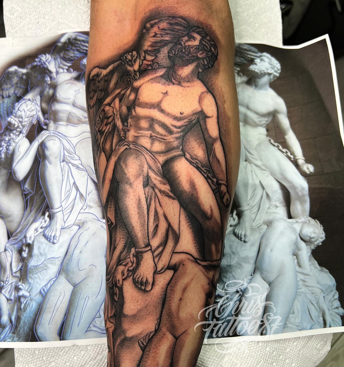 Hercules and centaur realism tattoo on the forearm by chris tattoo