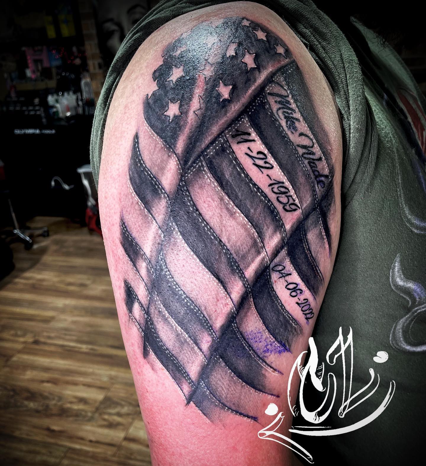 American flag American traditional tattoo on the shoulder by Labbé