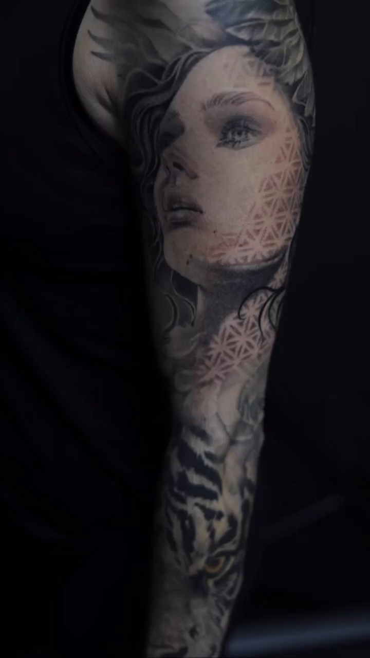 Tattoo by @vudoo_tattoo — realism, black_and_grey