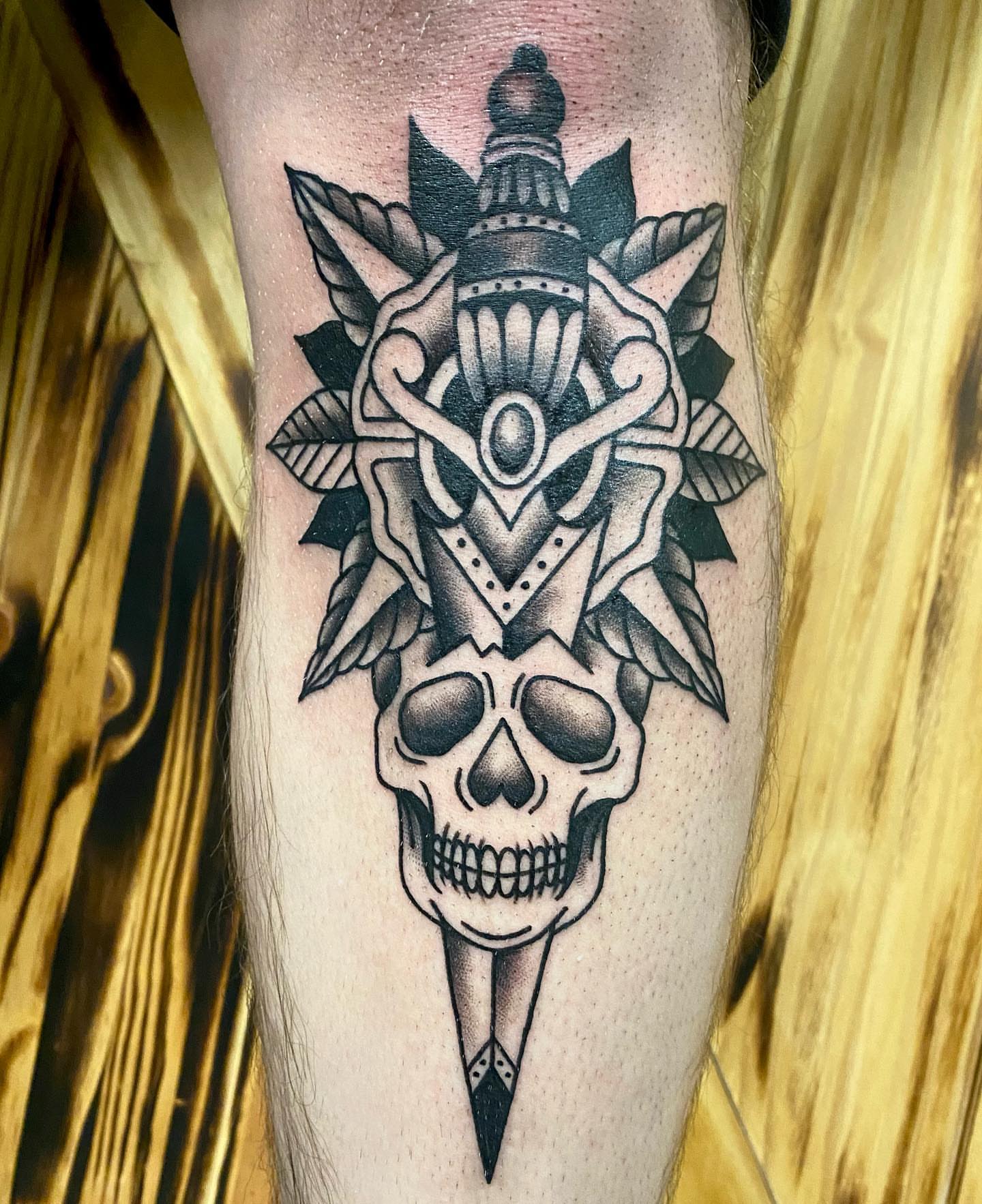Skull and ornamental design American traditional tattoo on the forearm by ππππππ ππππππ