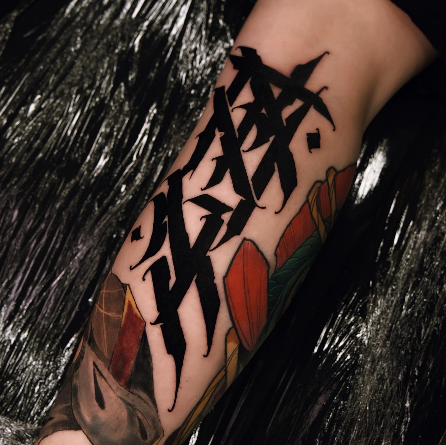 Kanji characters lettering script tattoo on the forearm by Zlata