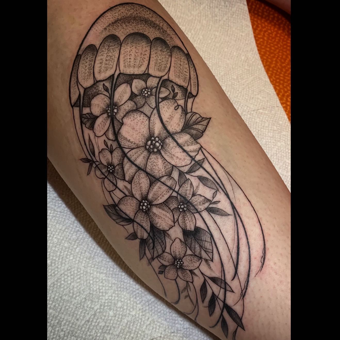 Flower bouquet dotwork tattoo on the forearm by Brad Sterling