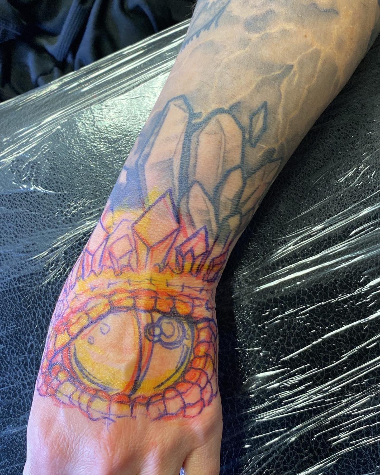 Tattoo by @inkplug__higherlevel — geometric, illustrative