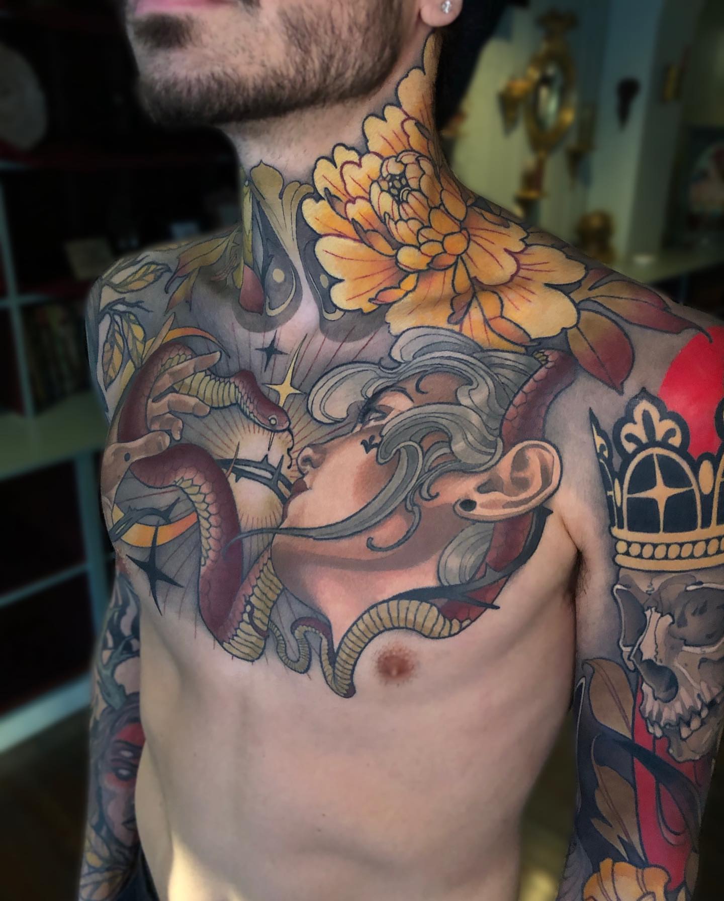 Serpent and woman neo-traditional tattoo on the chest by Levi Murphy