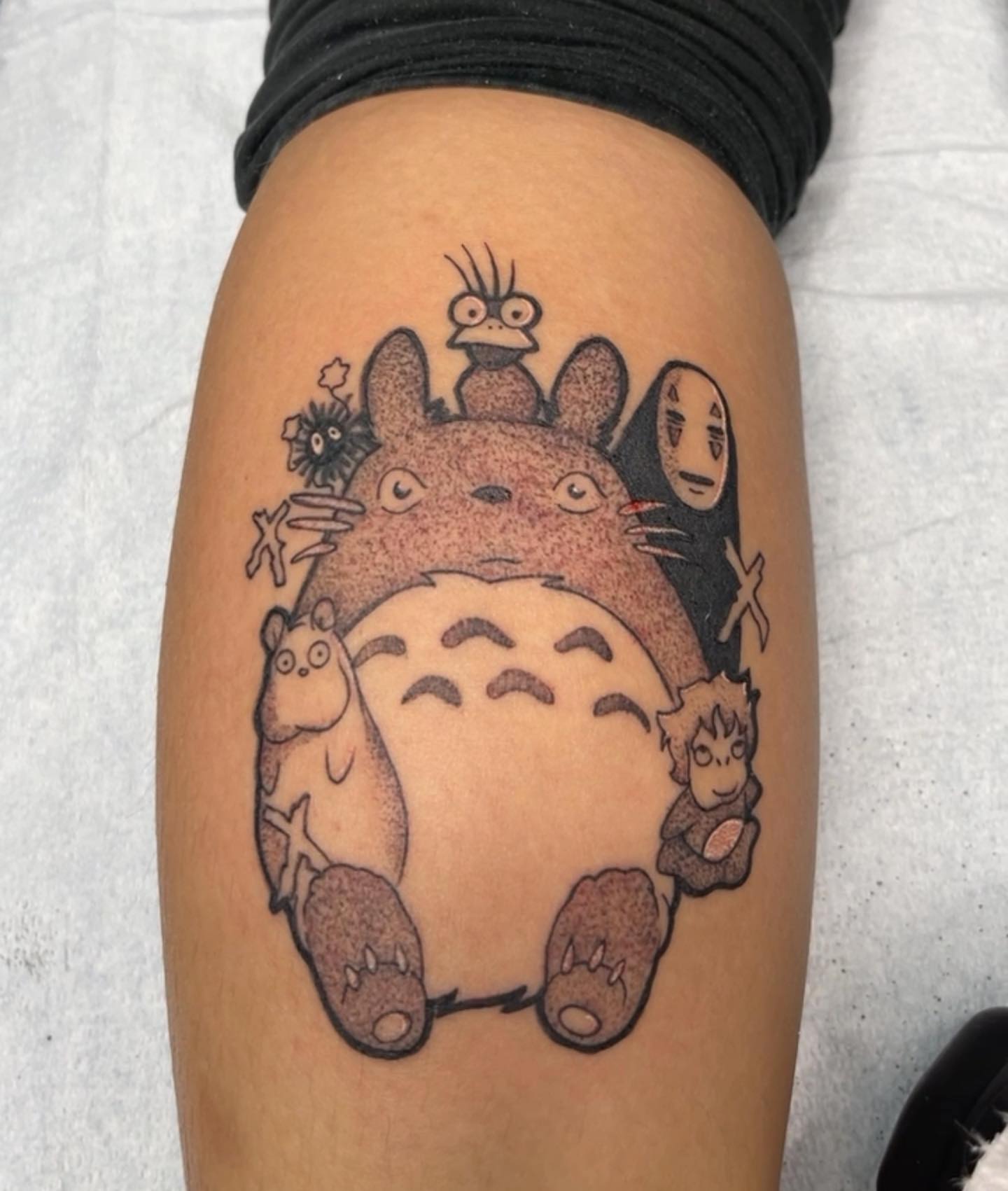 My Neighbor Totoro characters dotwork tattoo on the thigh by Pablo Venegas