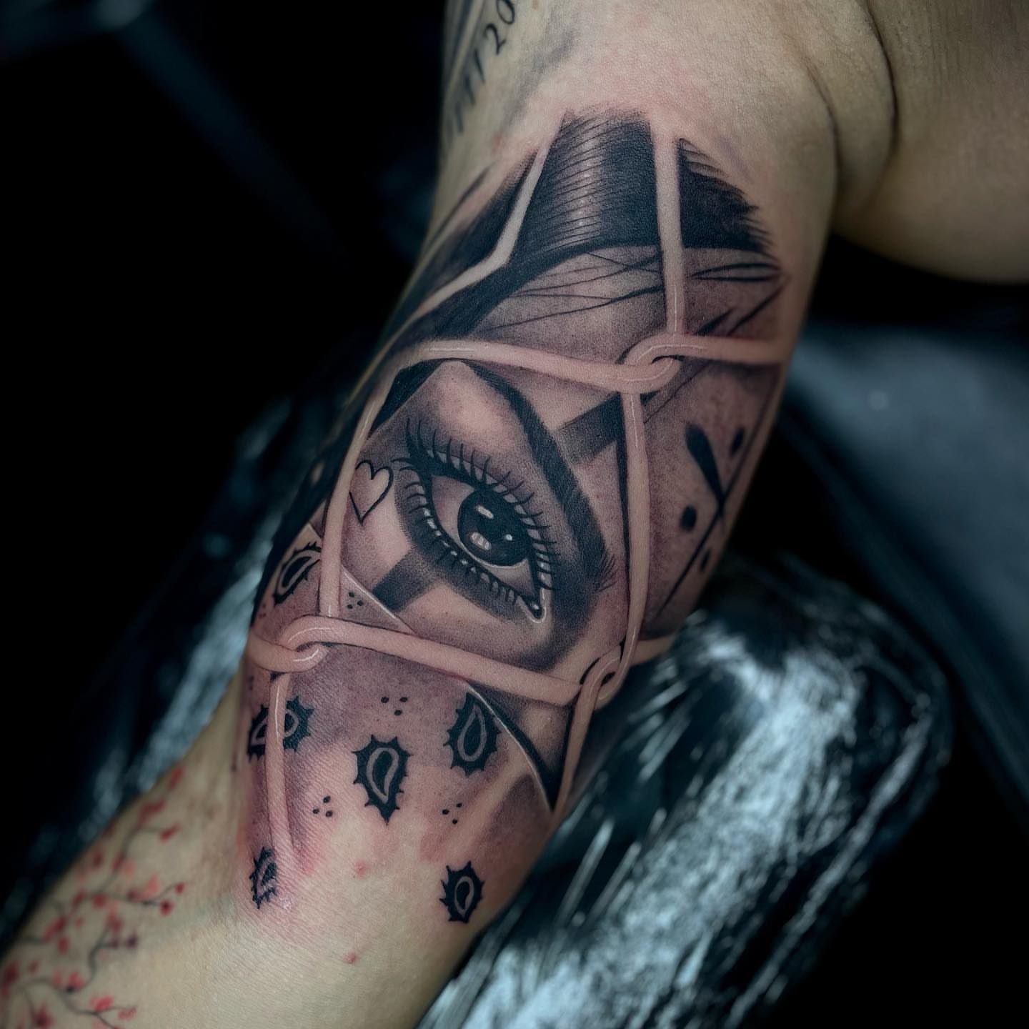 Eye realism tattoo on the forearm by Tam Nguyen
