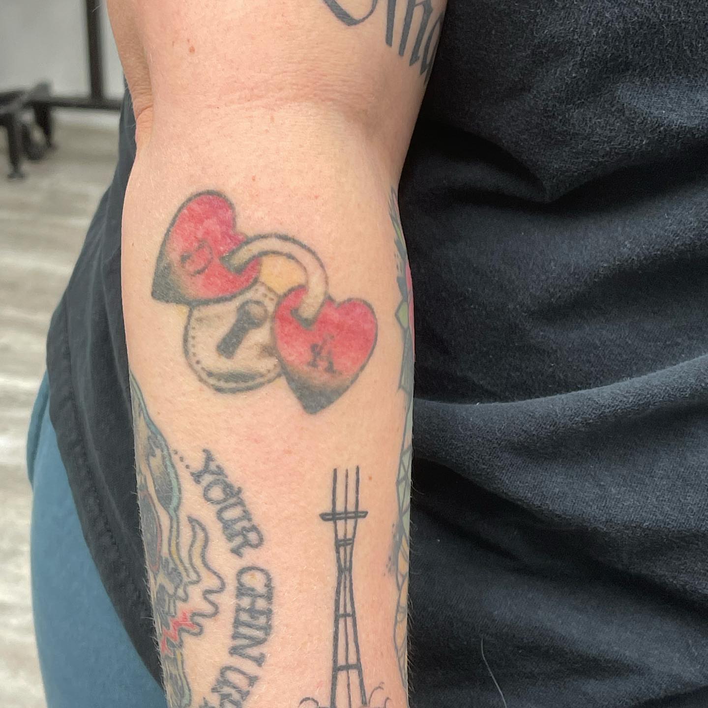 Key and heart black and grey tattoo on the forearm by Mister Joe Joe Frisco Tattoo, San Francisco, California