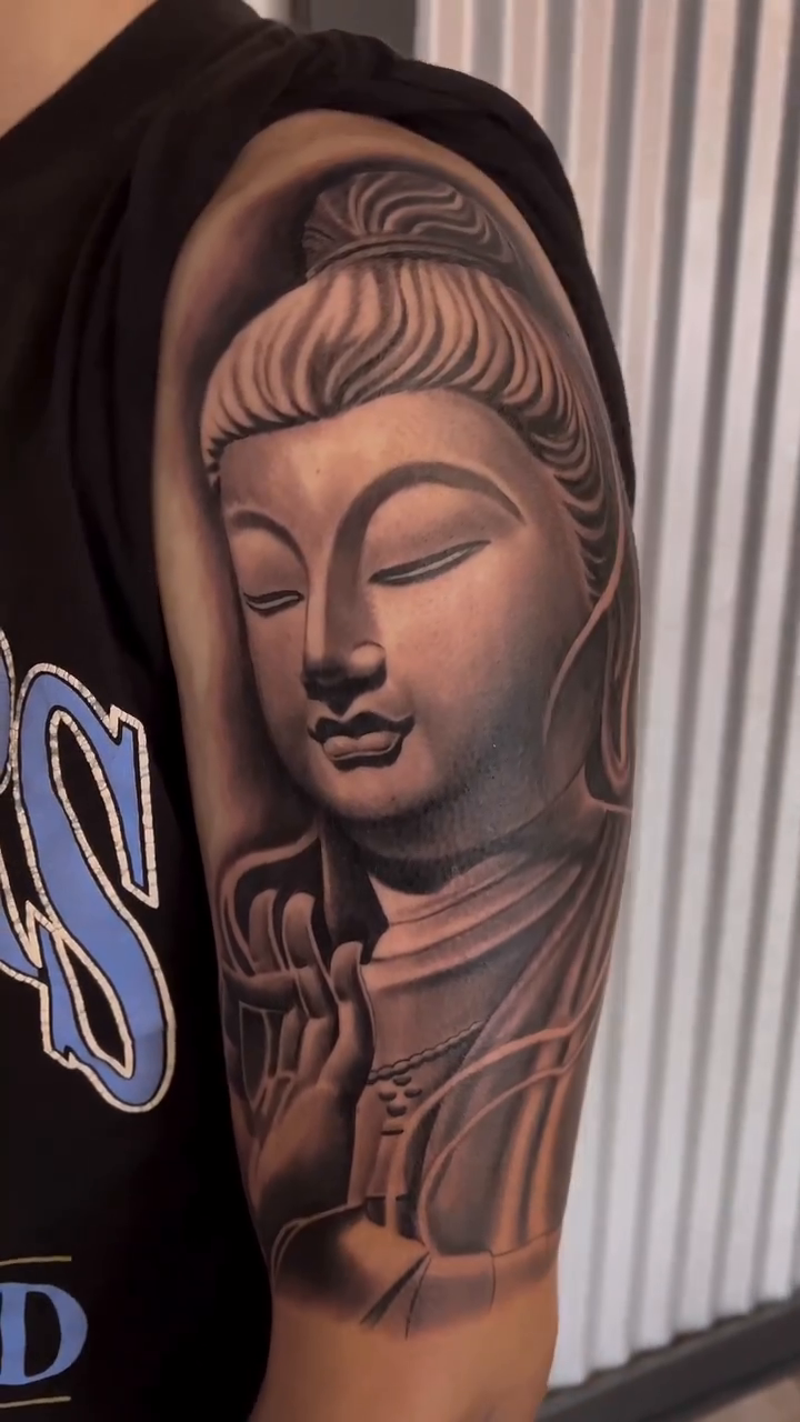 Buddha realism tattoo by Bill Johenning, Lakewood, Ohio