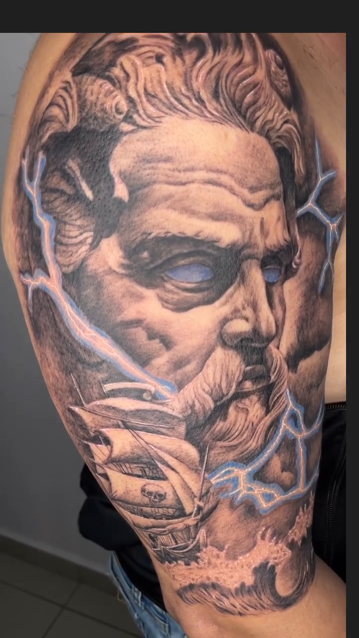 Tattoo by @elmertattoo1 — realism, black_and_grey