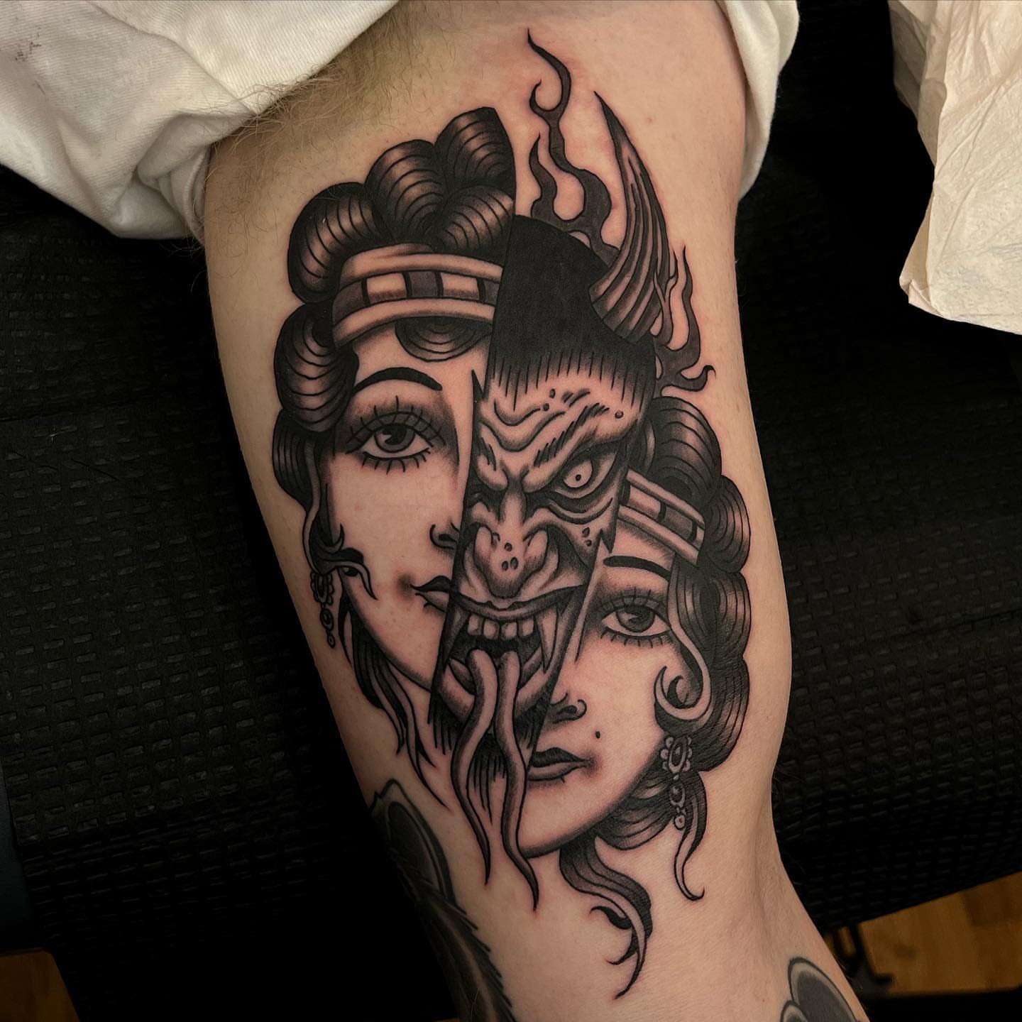 Geisha and demon mask American traditional tattoo on the forearm by David Mendieta