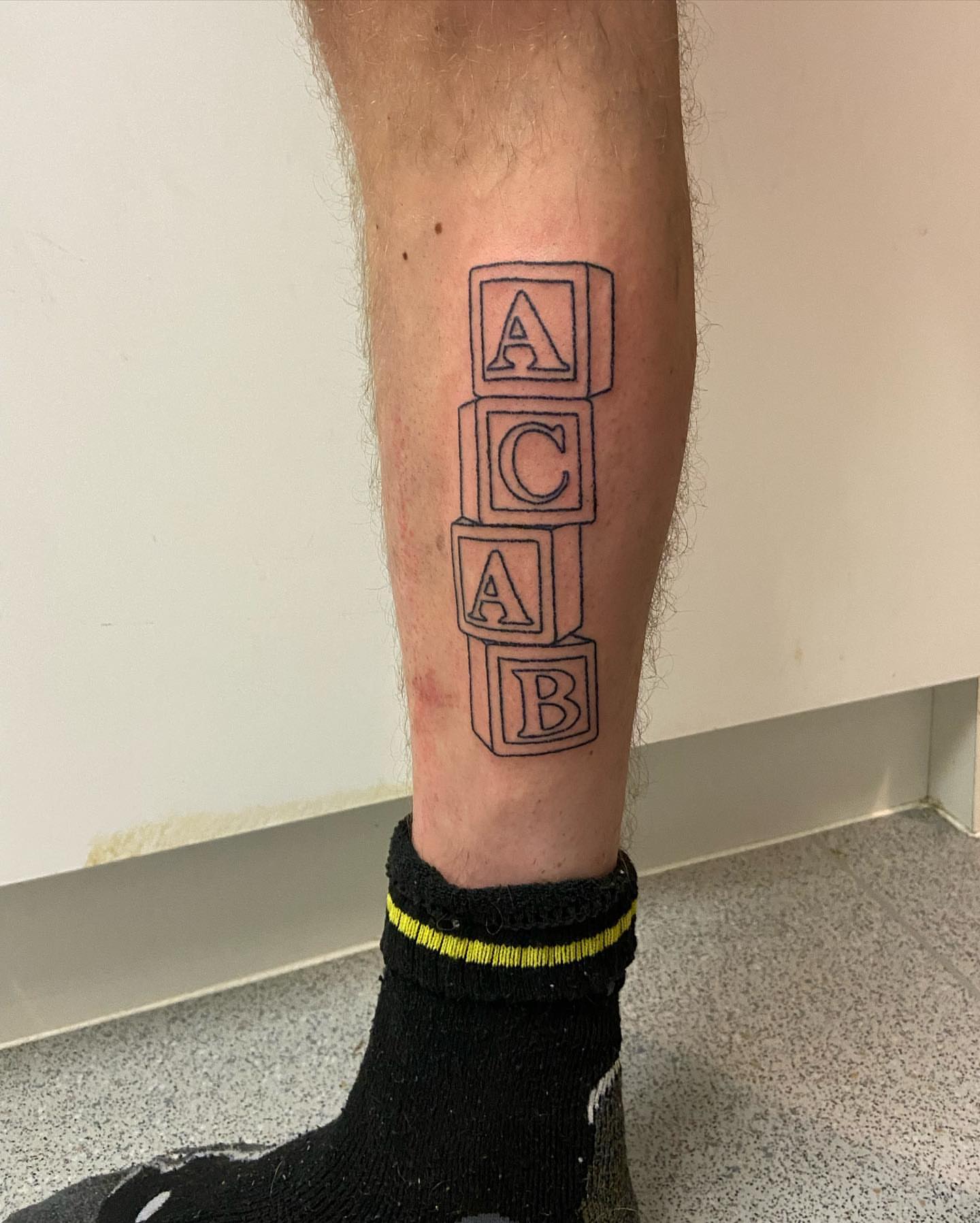 Tattoo by @deadboypokes — geometric