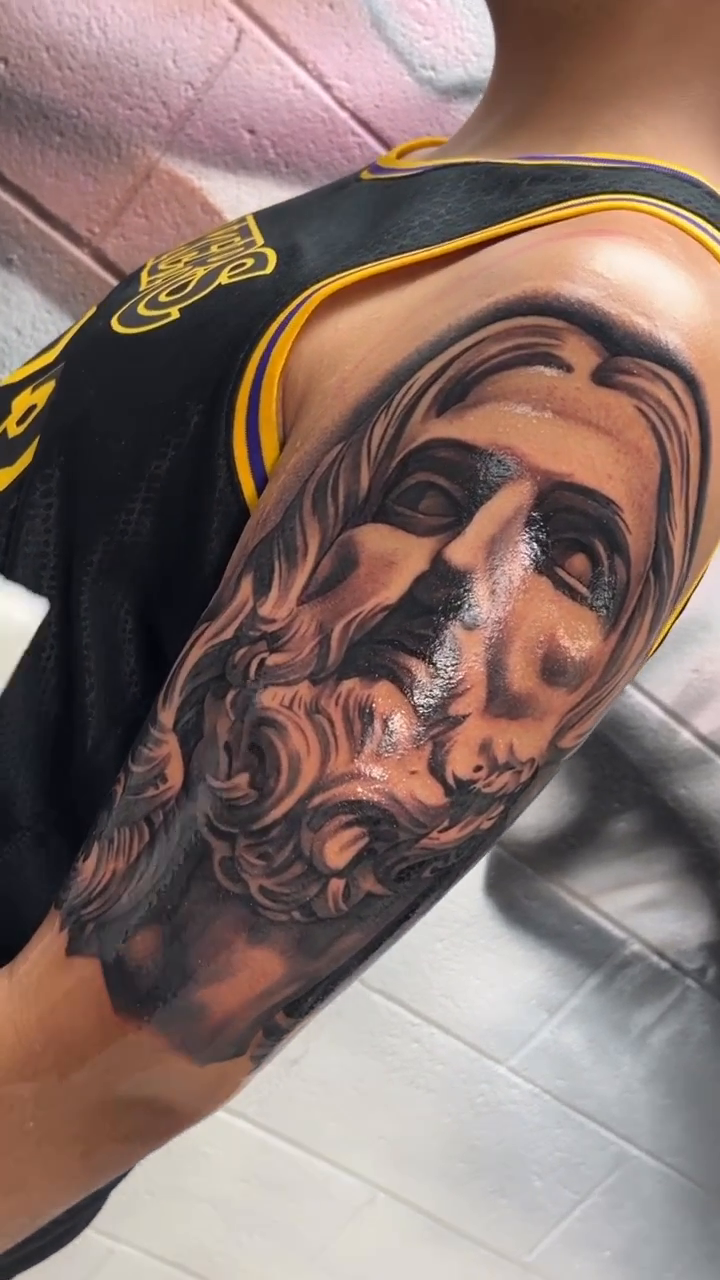 Jesus Christ portrait realism tattoo by Joseph Alvarado
