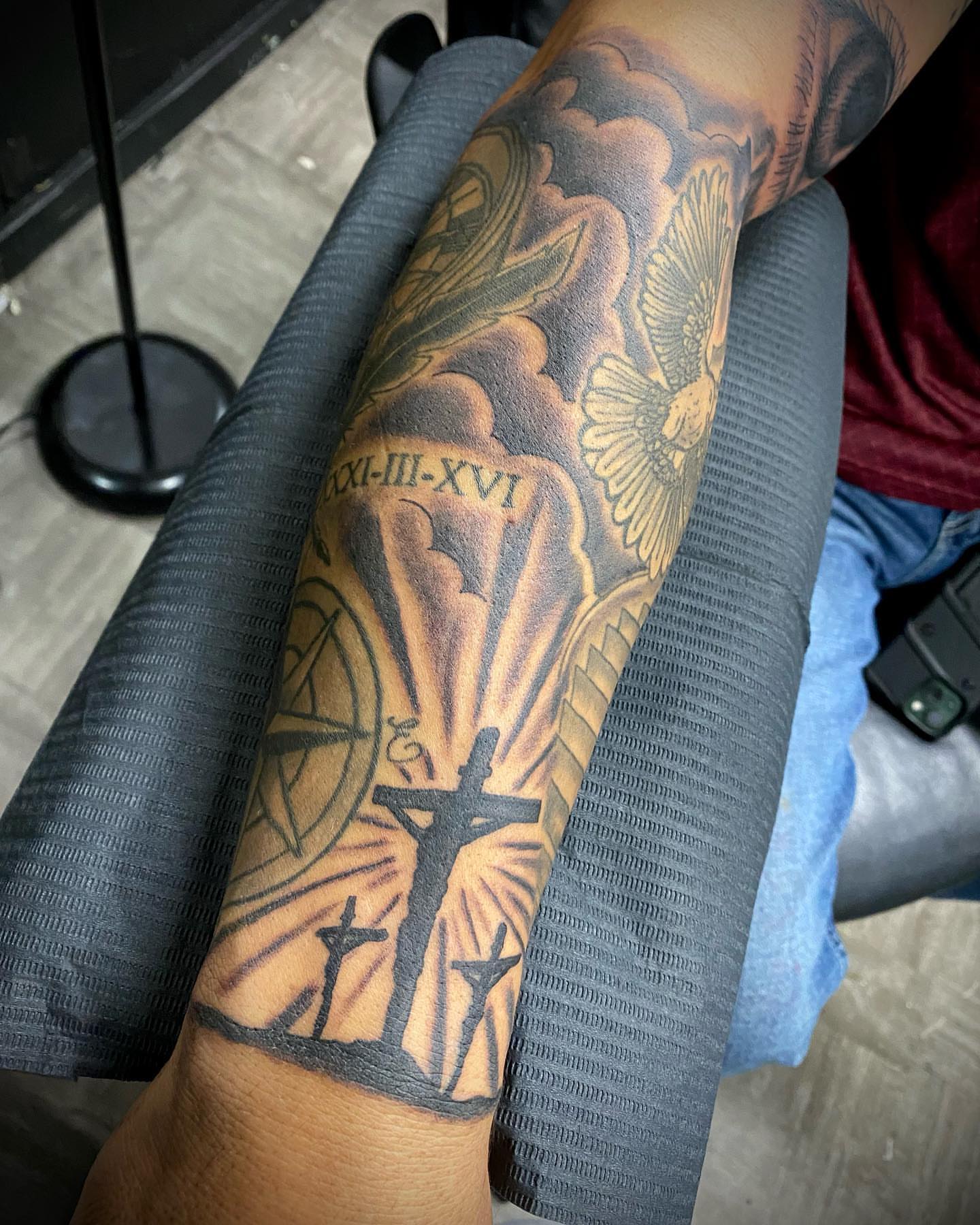 Religious crucifixion scene American traditional tattoo on the forearm by Anthony Pichardo 🦇