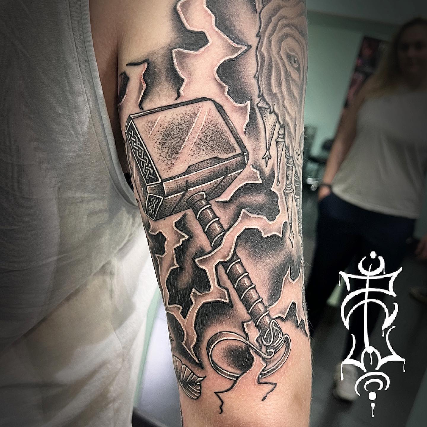 Thunder神锤 geometric tattoo on the forearm by Zack Havoc