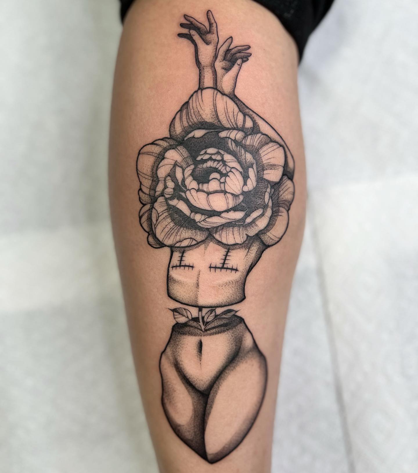 Rose dotwork tattoo on the thigh by Emily Jestine Francis