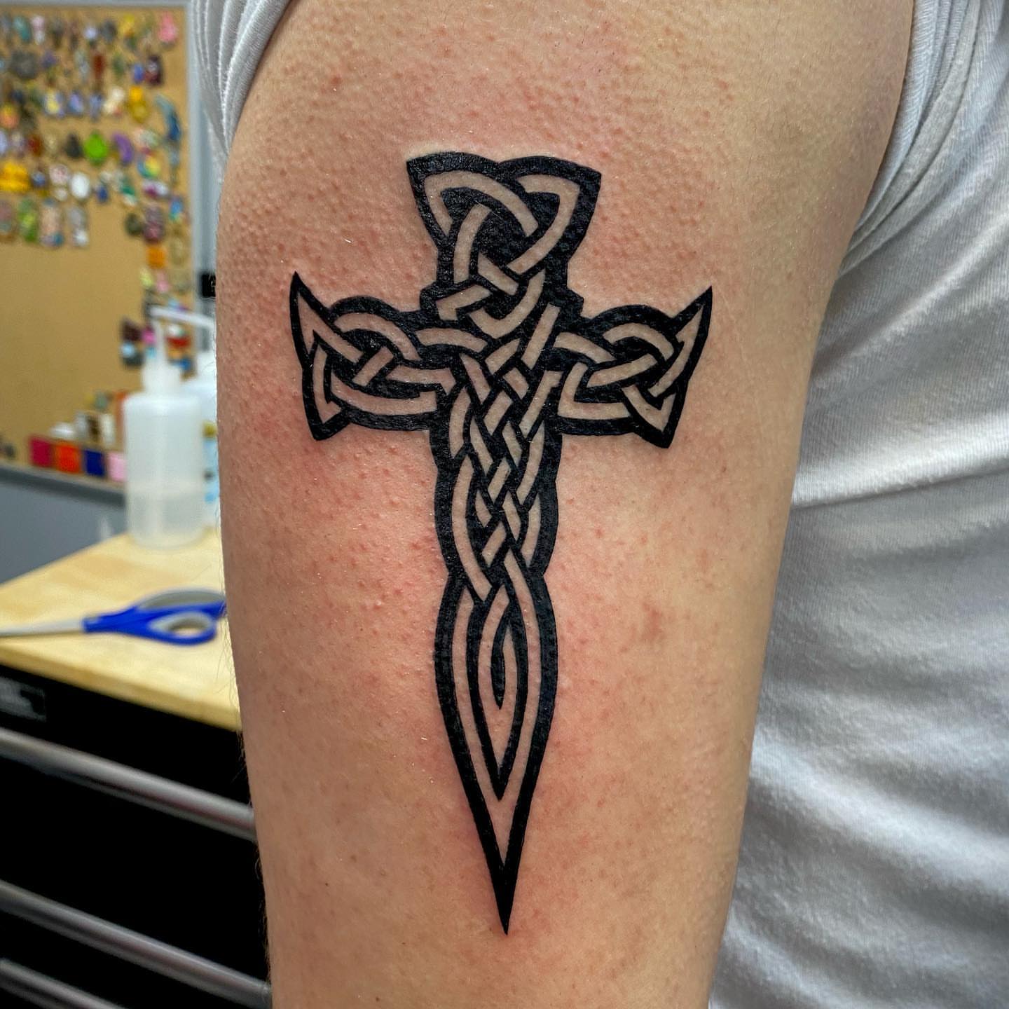 Celtic cross black and grey tattoo on the forearm by MR