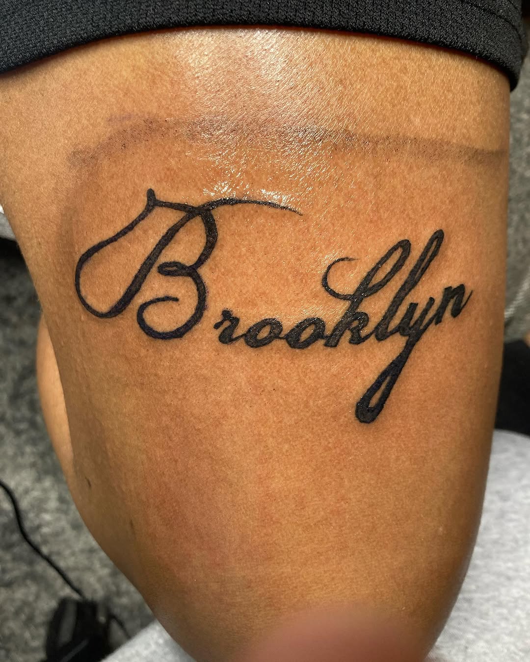 Brooklyn lettering lettering tattoo on the thigh by CmoreInk