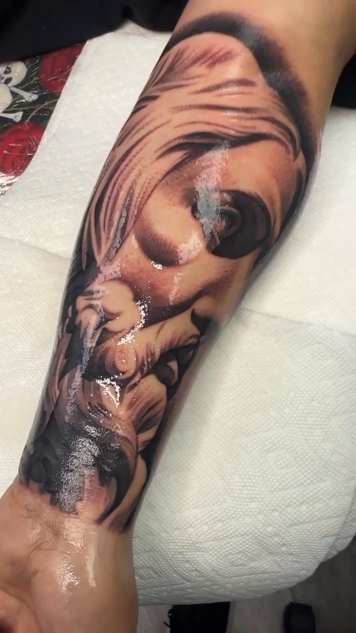 Portrait of a woman realism tattoo by Joseph Alvarado