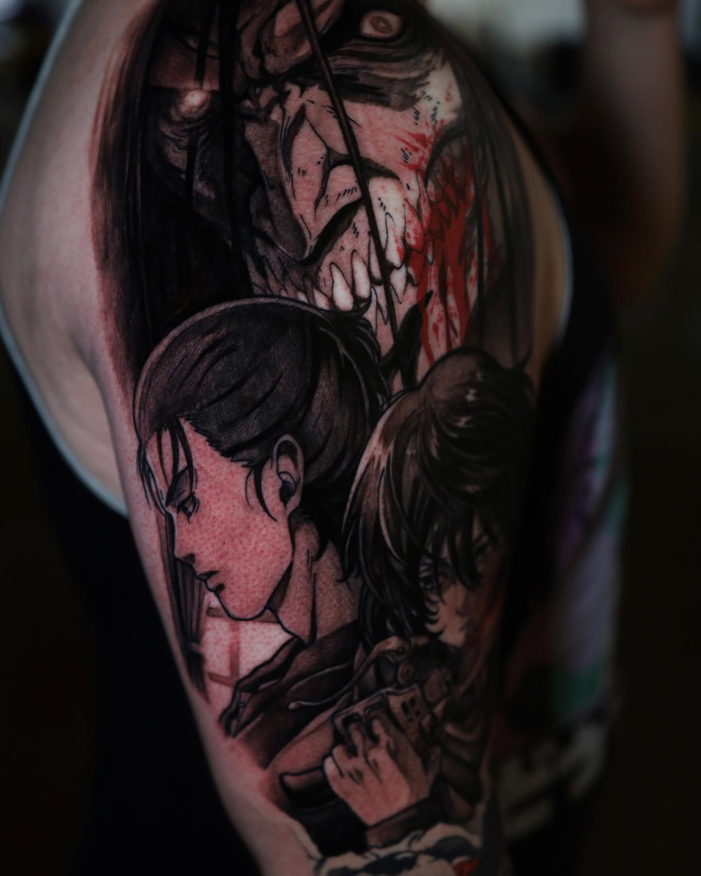 Anime characters anime tattoo on the upper arm by Gabriel Varelas, Phoenix, Arizona