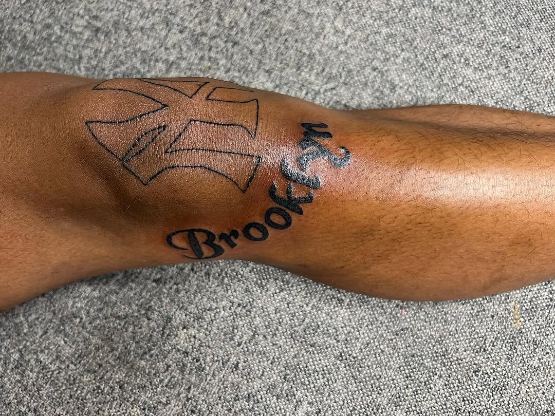 Brooklyn text and logo lettering tattoo on the forearm by CmoreInk