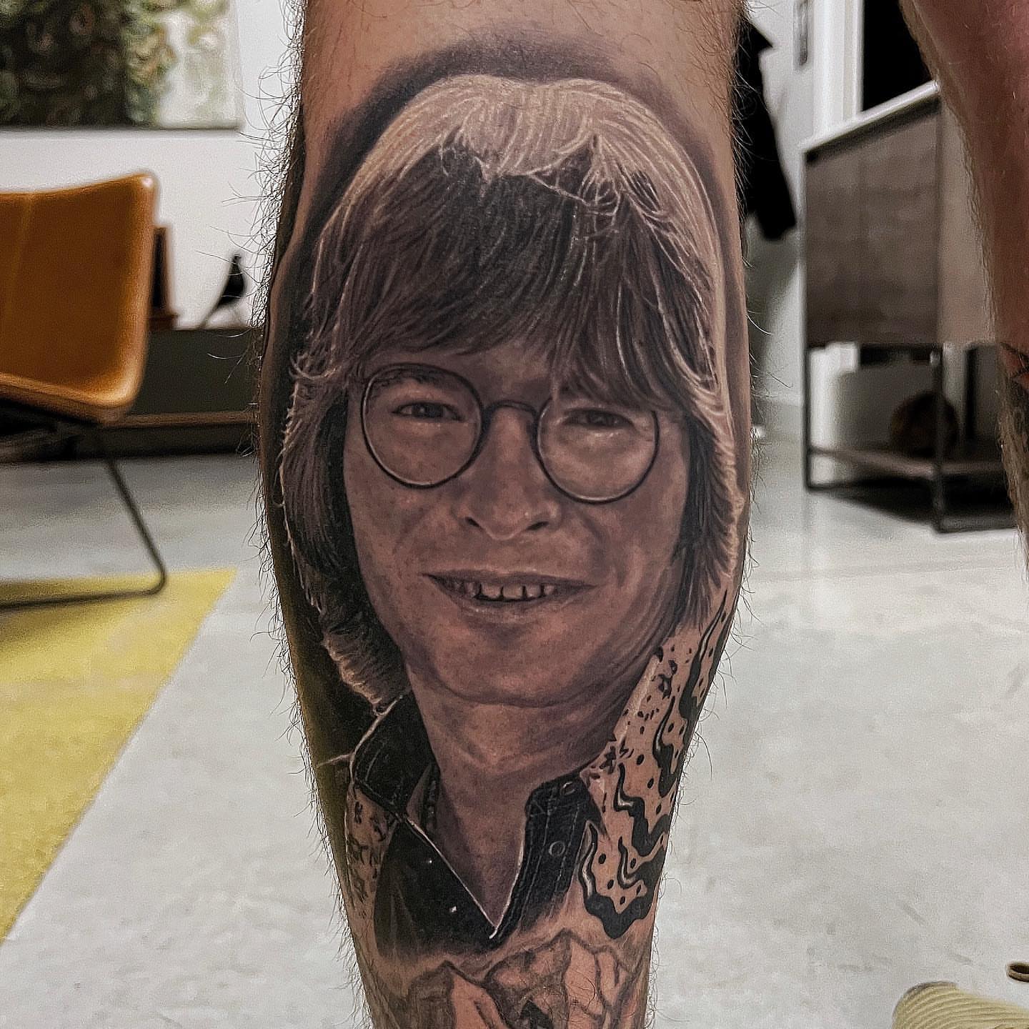 Portrait realism tattoo on the forearm by Rusty Dornhecker, Columbus, Ohio