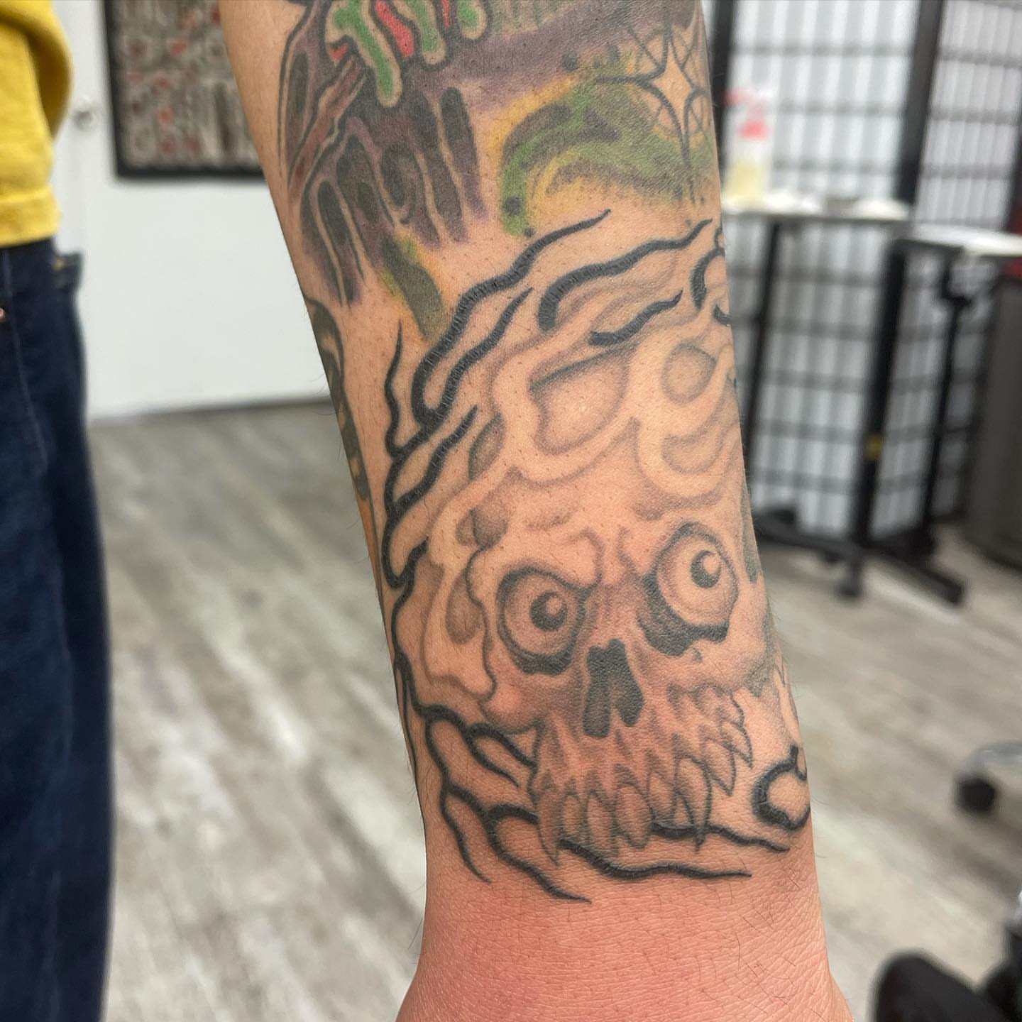 Skull black and grey tattoo on the forearm by Mister Joe Joe Frisco Tattoo, San Francisco, California
