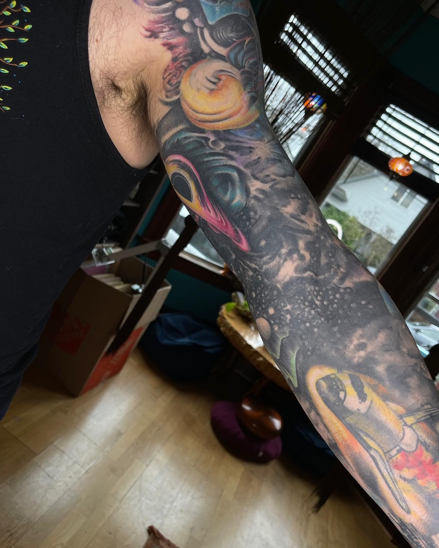 Abstract surrealism surrealism tattoo on the forearm by Shamanic Ink