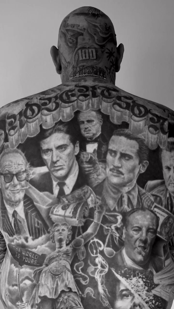Portraits of famous gangsters realism tattoo by Carlos Macedo Tattoo