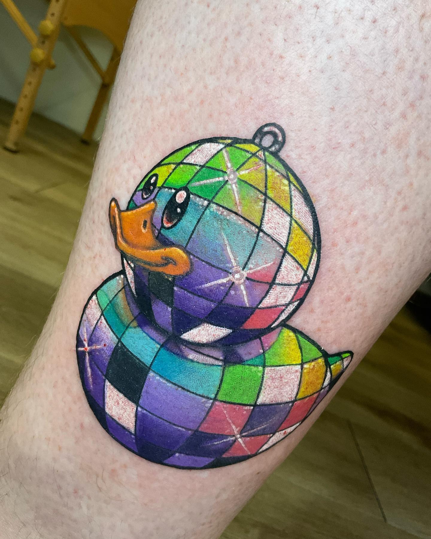 Rubber duck geometric tattoo on the thigh by Angell Tattoo Artist, Denver, Colorado