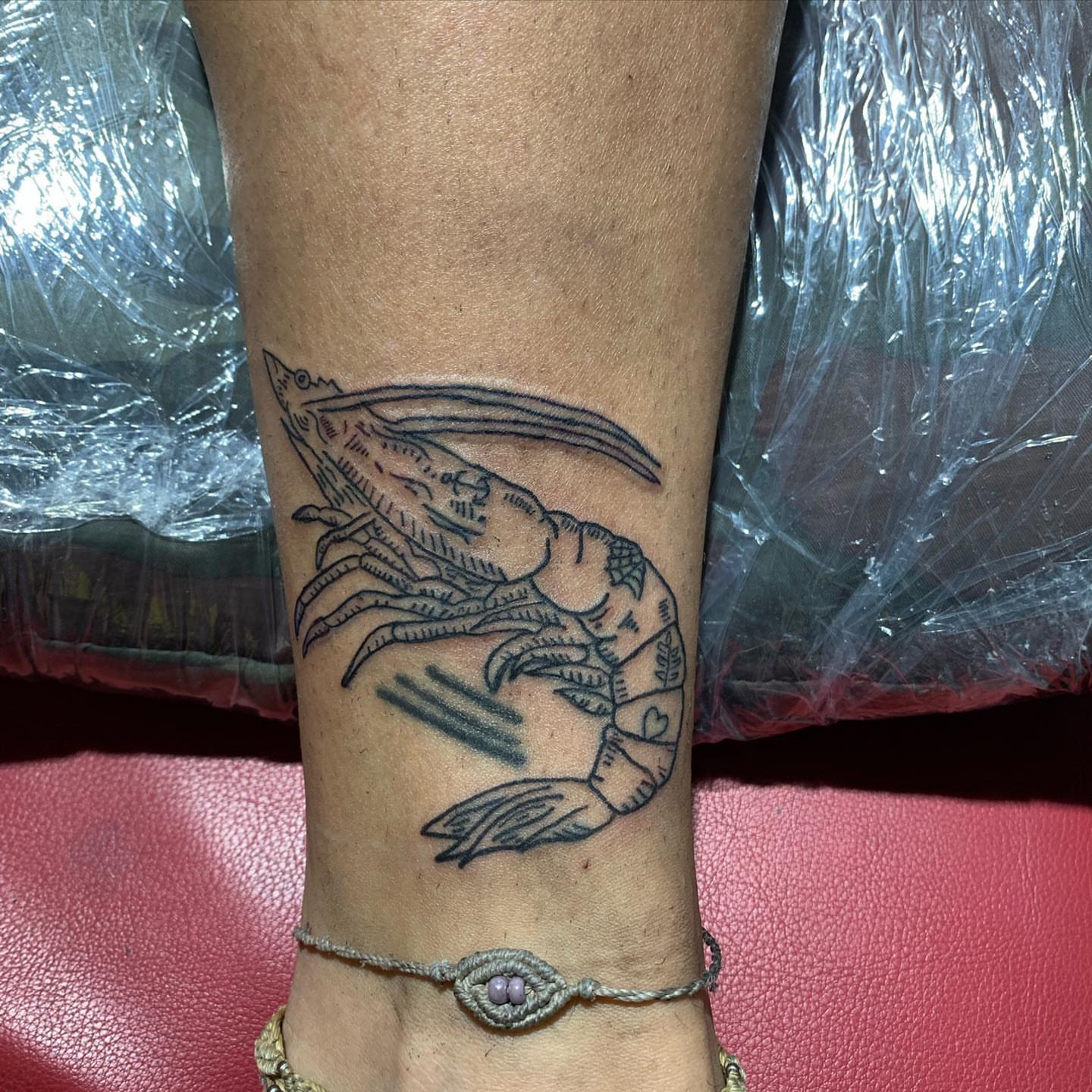 Prawn black and grey tattoo on the forearm by El Zepa