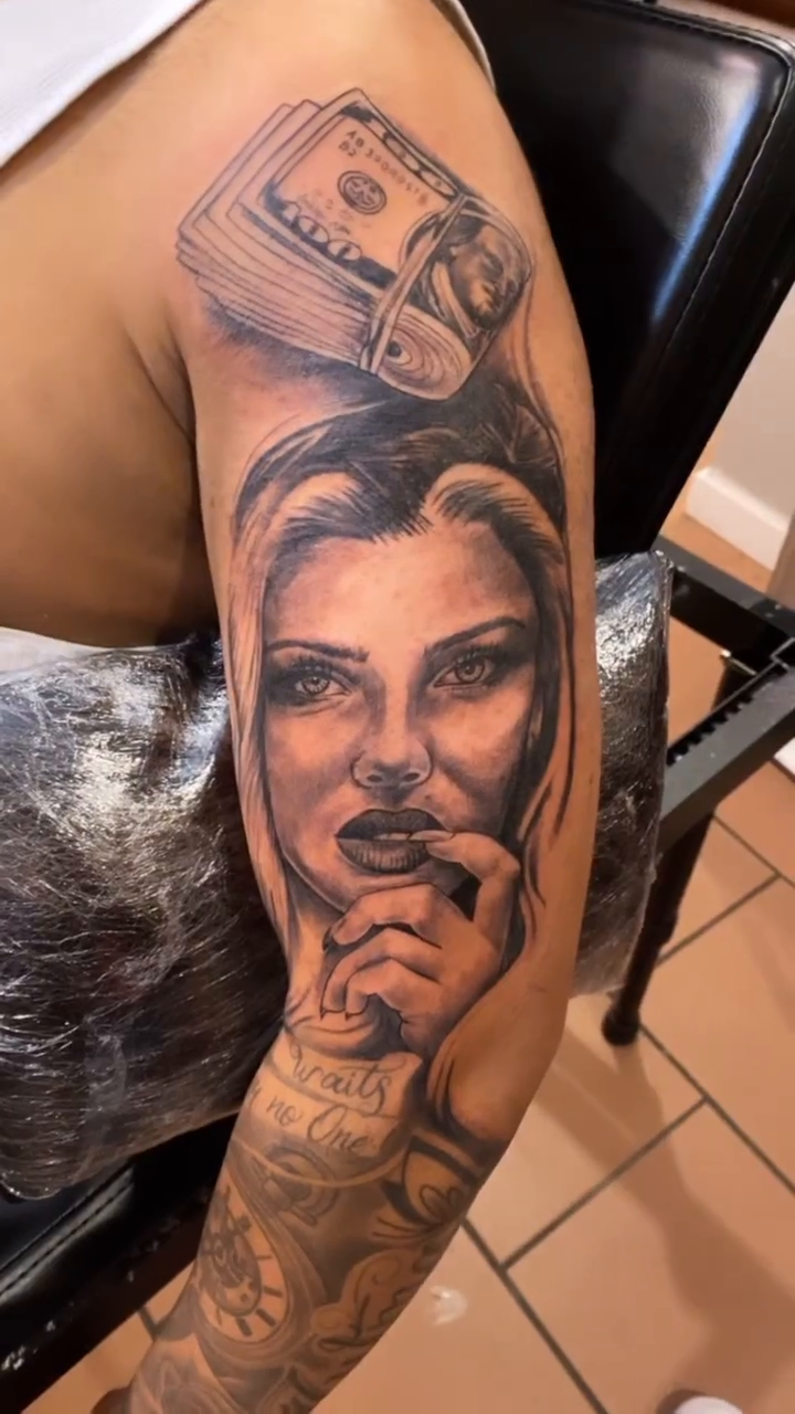 Woman and money realism tattoo by Breyner, Cambridge, Massachusetts