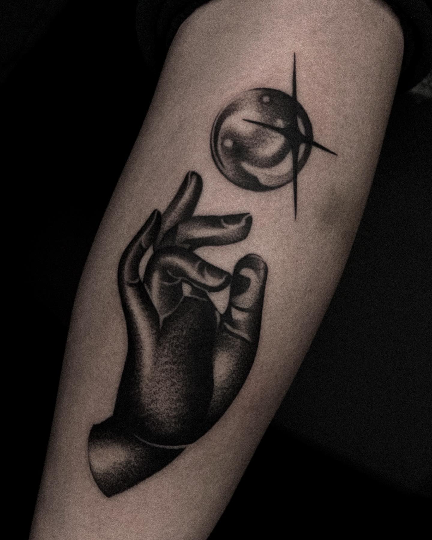 Hands and moon dotwork tattoo on the forearm by David Ha